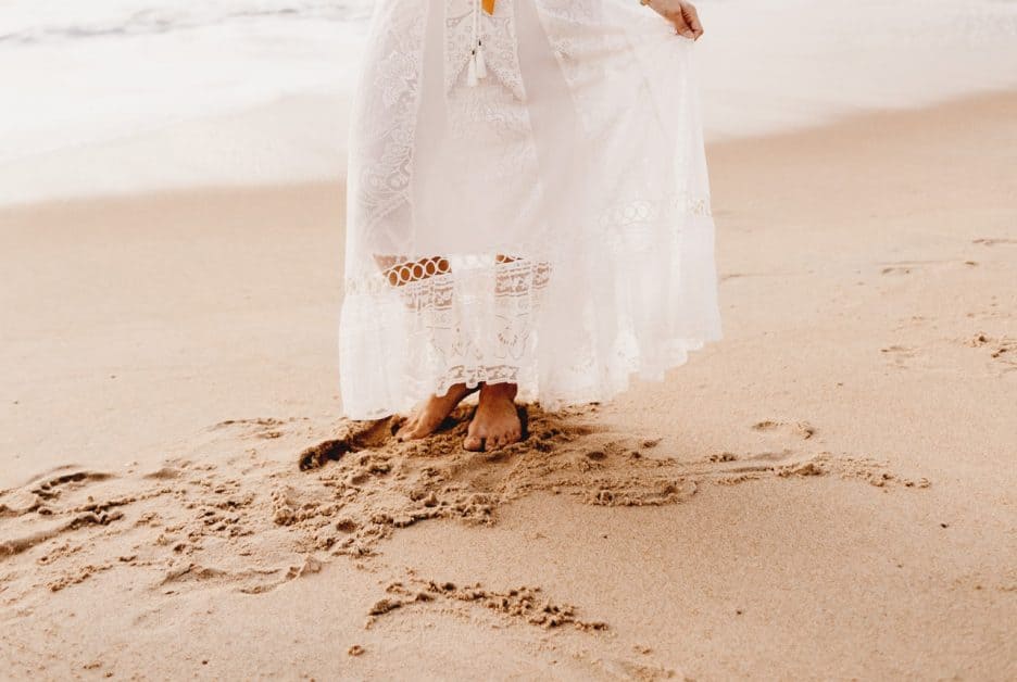 woman walking in the sand