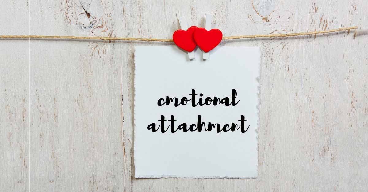 heart clip holding a paper with emotional attachment on it