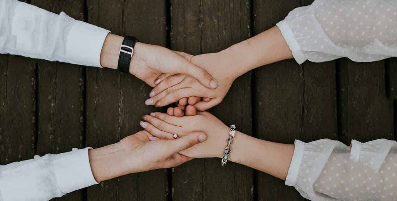 man and woman holding hands