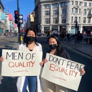 women holding signs
