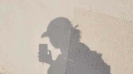 woman shadow on light wall