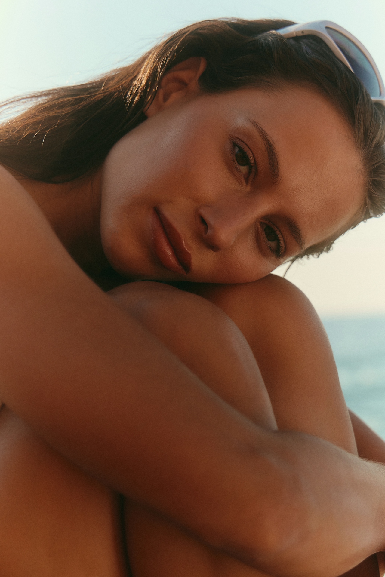 Women hugging her knees