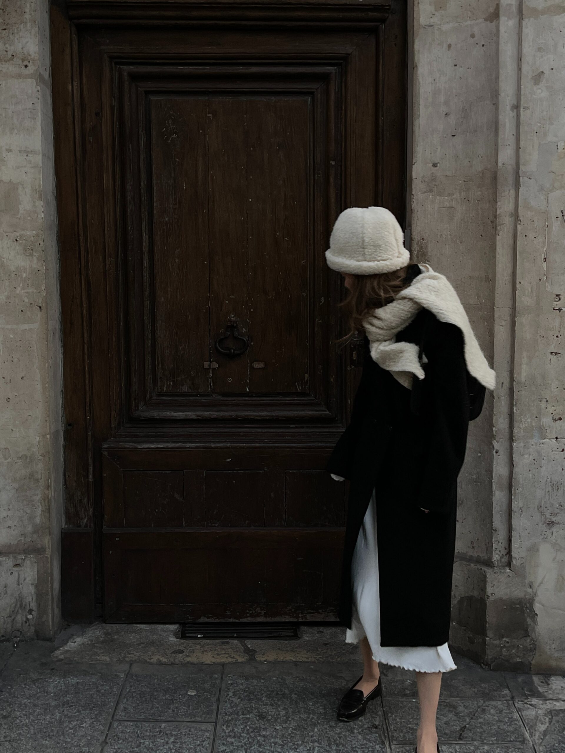 women in coat grey weather